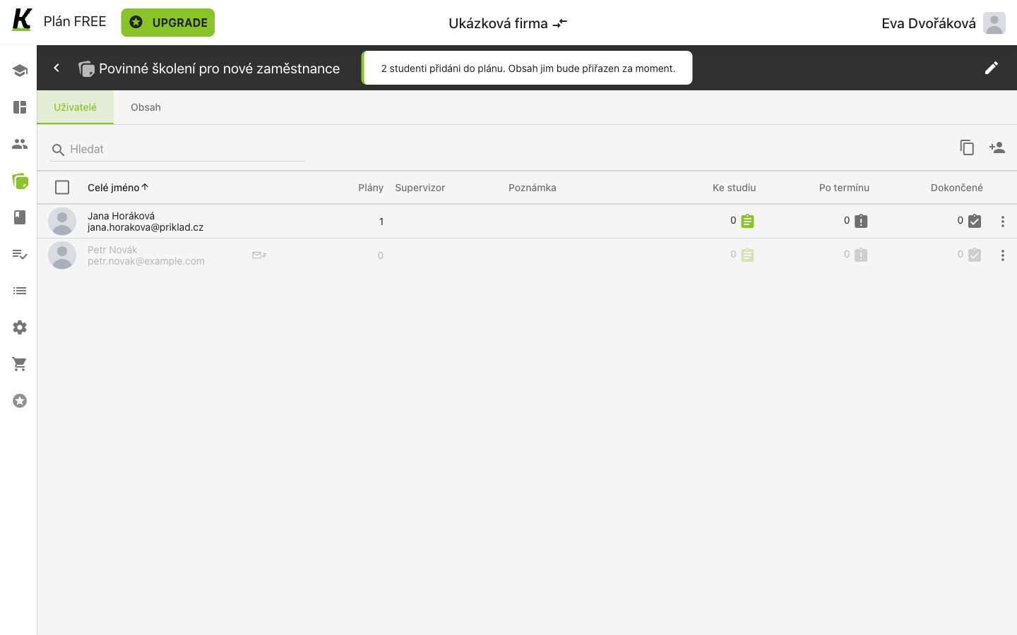The plan's Users tab a moment after saving: a toast says two students were added and the content will be assigned shortly, while every count still reads zero.